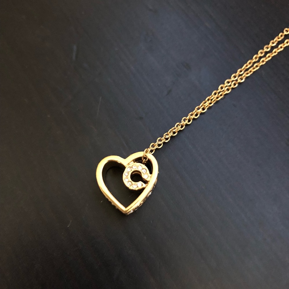 Gold coach necklace